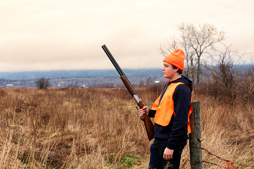 A young bird hunter out in the autumn