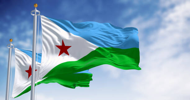 National flag of Djibouti waving in the wind on a clear day National flag of Djibouti waving on a clear day. Horizontal bicolor with equal bands of light blue and light green, with a white, equilateral triangle with a red star. 3d illustration render. flag of djibouti stock pictures, royalty-free photos & images