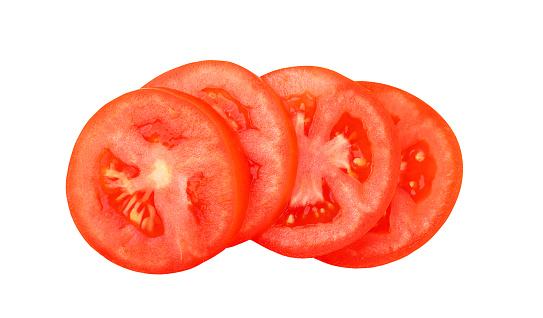 Slices of tomato isolated on white background. Top view