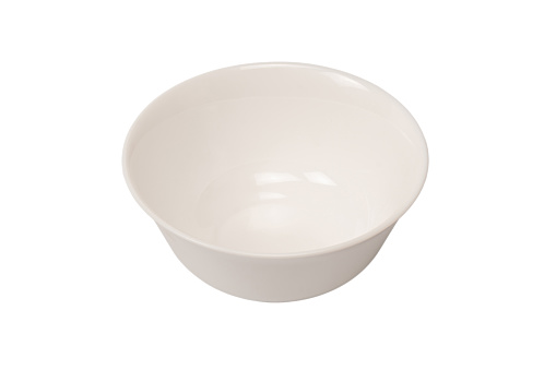 Ceramic white bowl isolated on a white background.