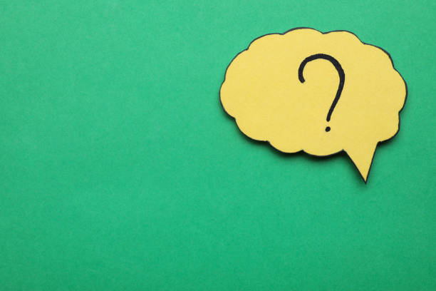 istock Paper speech bubble with question mark on green background, top view. Space for text 1937826139
