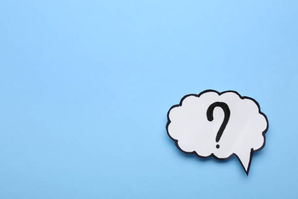 istock Paper speech bubble with question mark on light blue background, top view. Space for text 1937828802
