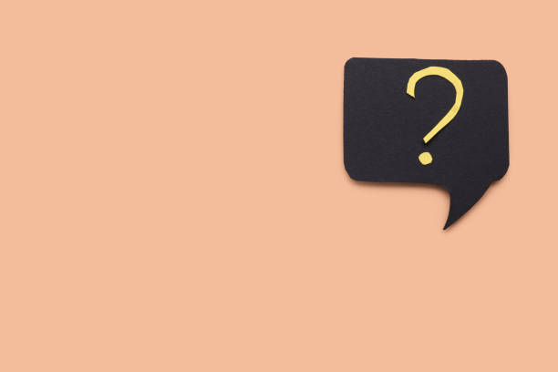 istock Paper speech bubble with question mark on beige background, top view. Space for text 1937829255