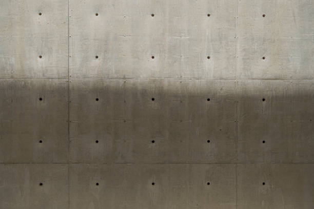 Texture of concrete wall for background. Natural cement shades background.Natural cement shades found in a concrete construction. concrete in formwork stock pictures, royalty-free photos & images