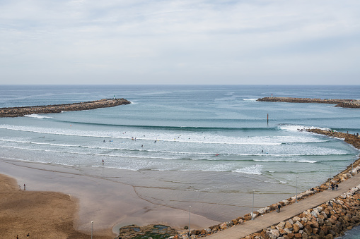 View of the ocean and the breakwaters that separate the mouth of the Bou Regreg river from the Atlantic Ocean.