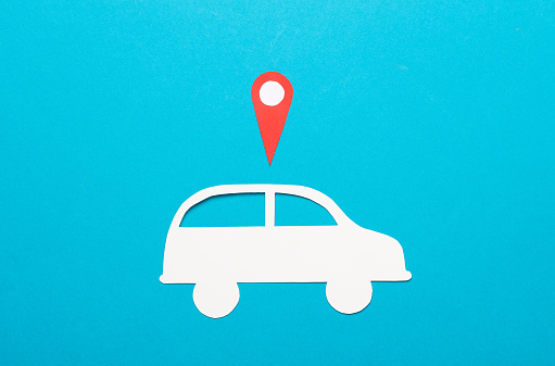 Paper cut car and Geolocation Maps Marker point icon on blue background