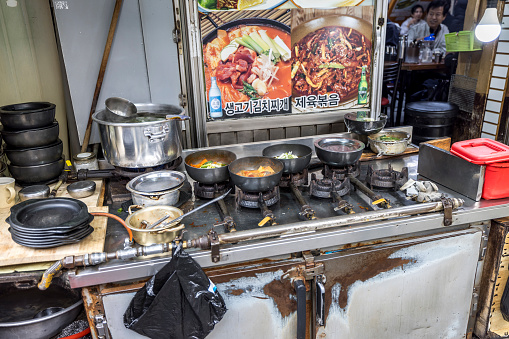 seoul, south korea - october 22, 2023: street food kitchen at the kwangjang market in seoul.