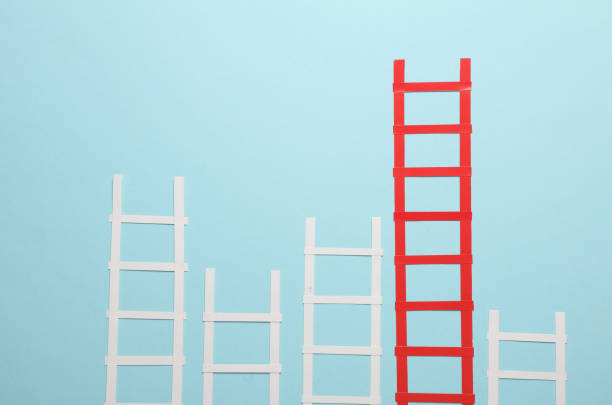 istock Paper red and white stairs on blue background. Business concept 1937856871