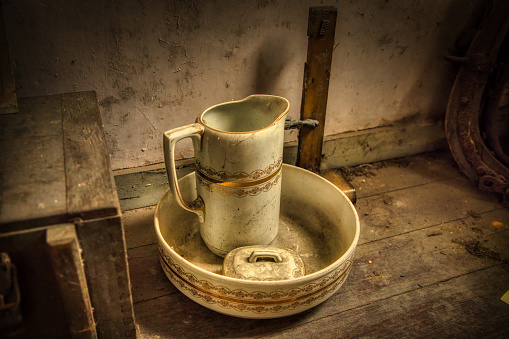 Old wash bowl for morning washing. Dusty and abandoned. Inspiration from a farmhouse that was demolished and lost in history.