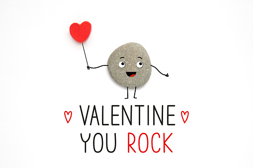Funny cute stone and text Valentine you rock. Cool encouragement concept.
