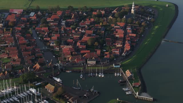 Aerial drone view of harbour of Hindeloopen with sail boats, Friesland, Holland.