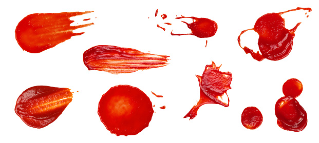 Close up collection of different red ketchup tomato sauce wet stains isolated on white background, top view, directly above