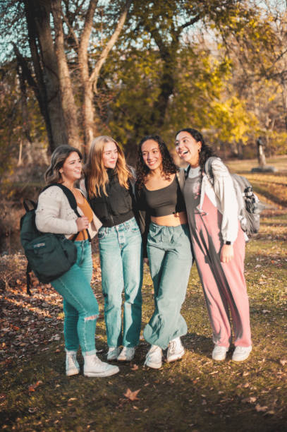 istock Schoolgirls in the park 1937967526