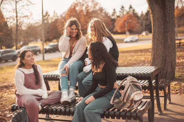 istock Schoolgirls in the park 1937967553