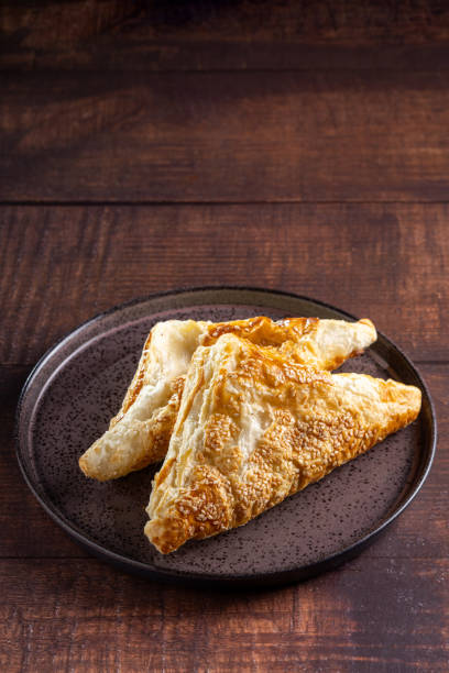 istock Chicken puff pastry. Baked puff pastry stuffed with chicken. 1937976497
