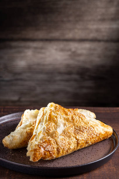 istock Chicken puff pastry. Baked puff pastry stuffed with chicken. 1937976502