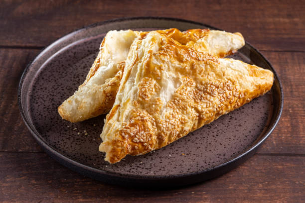 istock Chicken puff pastry. Baked puff pastry stuffed with chicken. 1937976504