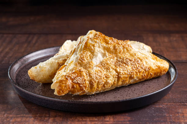 istock Chicken puff pastry. Baked puff pastry stuffed with chicken. 1937977021