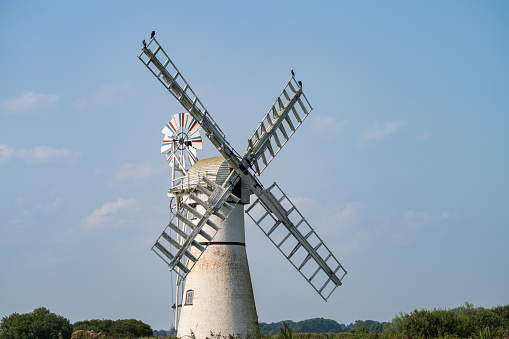 Thurne mill on a blue sky day in the Norfolk Broads September, 2023