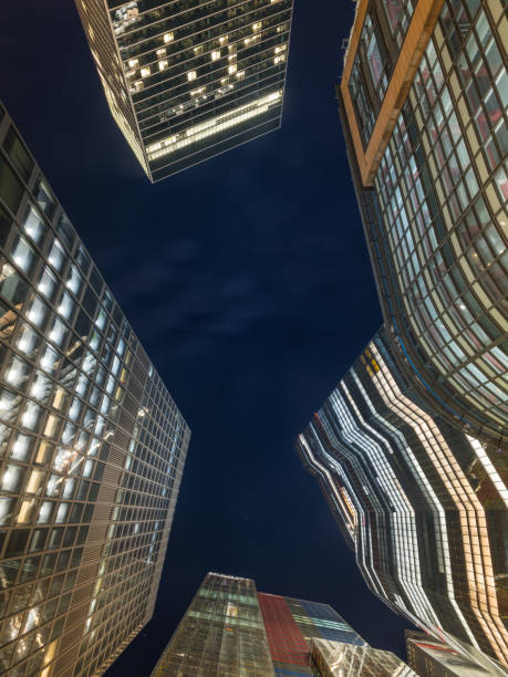 istock Stars shining above downtown skyscrapers soaring into night sky 1938042775