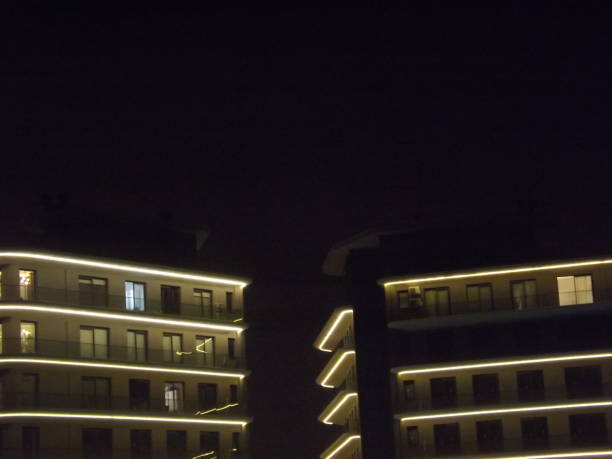 istock houses illuminated at night 1938087941