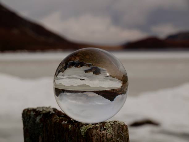 istock Frozen lake through lens ball 1938093898