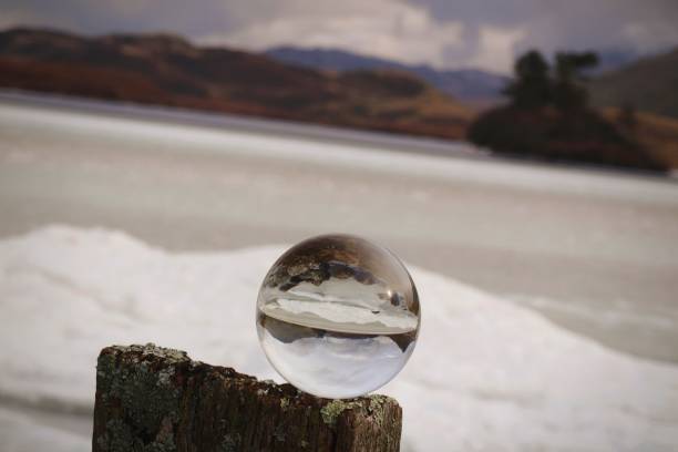 istock Frozen lake through lens ball 1938093911