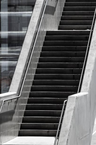Tall concrete stairs in sunshine.