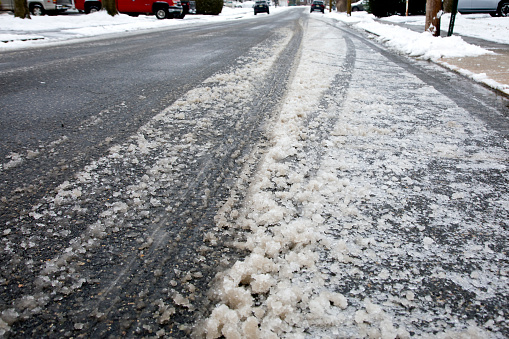 Slippery icy, slushy, conditions on roadway.