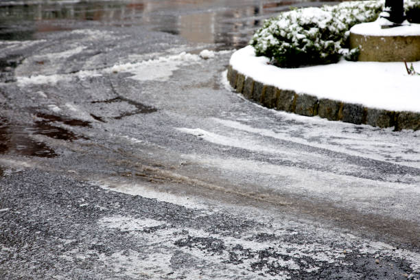 Slippery icy, slushy, conditions on roadway.