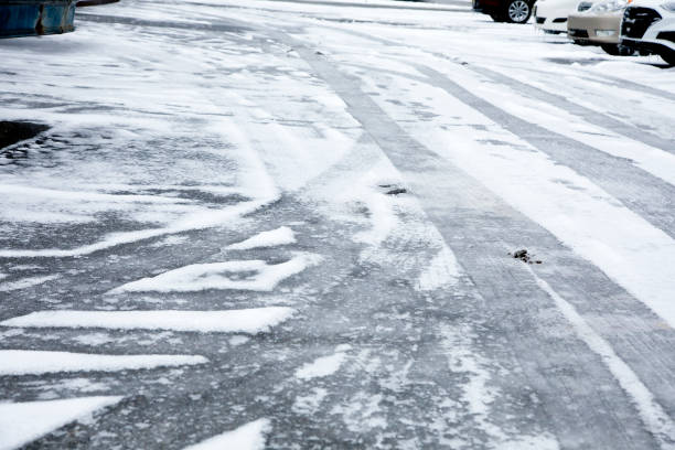 Slippery icy, slushy, conditions on roadway.