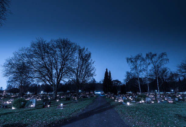Gothenburg, Sweden - november 02 2019: Grave candles on a cemetery on all saints eve..