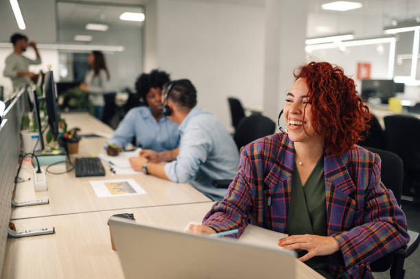 istock Hispanic customer services agent woman with headset working in an call center 1938200221