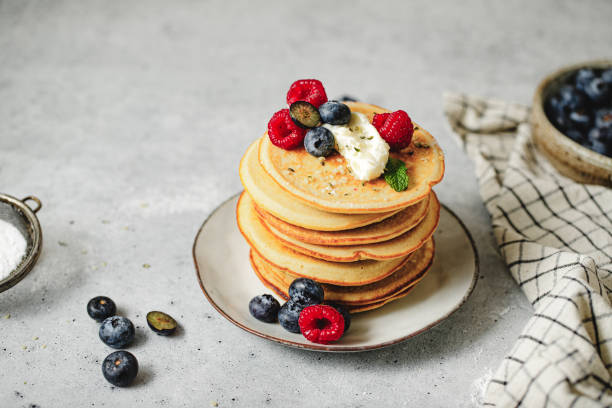 Homemade pancakes served on table