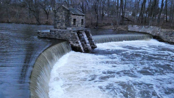istock Speedwell Stonewall Dam with High Water Flow 1938212796