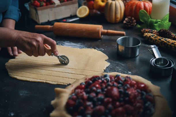 istock Preparing Berry Pie in Domestic Kitchen 1938272537