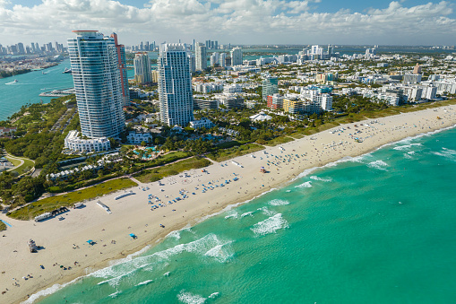 View from above of american southern seashore of Miami Beach city. South Beach high luxurious hotels and apartment buildings. Tourist infrastructure in southern Florida, USA.