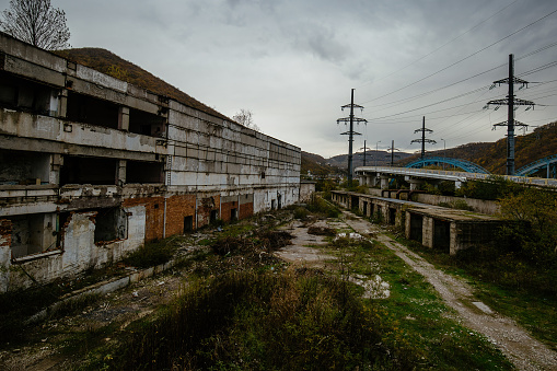 Territory of abandoned industrial area waiting for demolition.