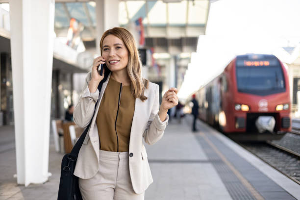 istock Young woman traveling by train and using smart phone 1938541168