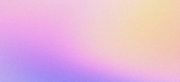 istock Purple yellow pink grainy gradient background retro noise texture pastel color gradients banner backdrop design 1938549989