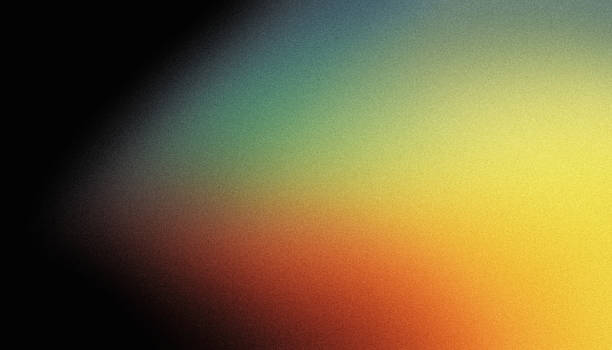 istock Grainy dark abstract background orange yellow green glowing blurred noise texture black backdrop copy space wide banner header poster design 1938549992
