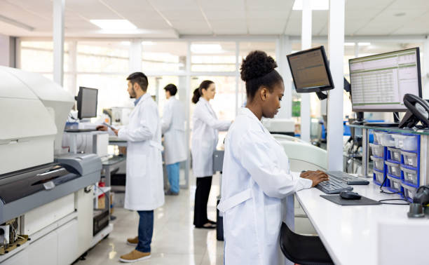 istock Group of scientists working at the laboratory researching 1938554515