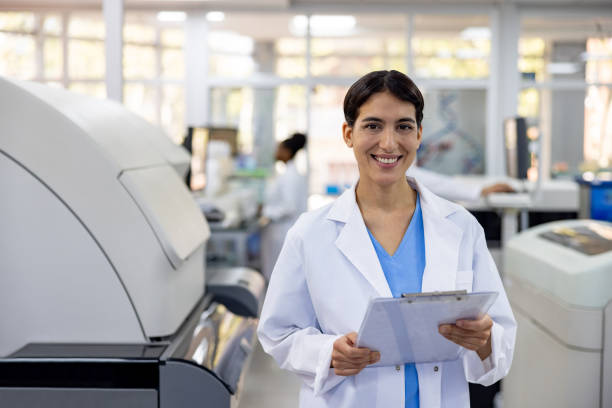 istock Happy female doctor working at a laboratory 1938554554