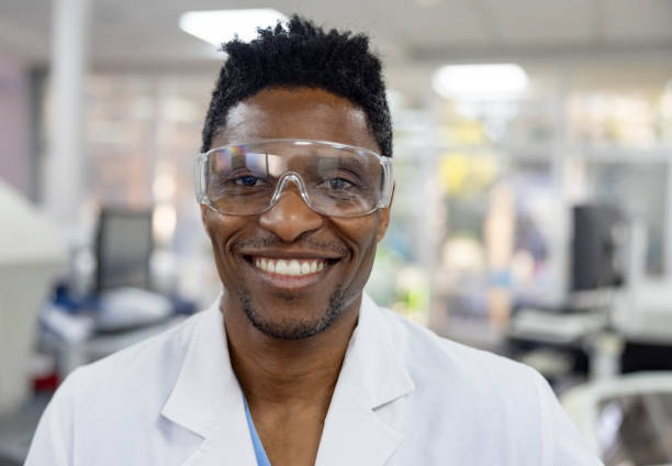 istock Doctor working at the laboratory and using protective workwear 1938555675