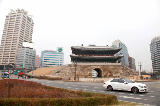 Sungnyemun Gate or Namdaemun Gate in Seoul, South Korea Seoul, South Korea - July 4, 2018. Sungnyemun Gate also known as Namdaemun gate in downtown Seoul. seoul bus stock pictures, royalty-free photos & images