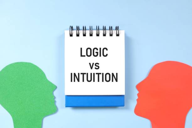 istock Logic versus intuition concept. Human head profile in blue background. 1938576883