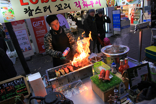 Seoul, South Korea - November 28, 2016. Scene in Myeondong Market during evening time in downtown Seoul.