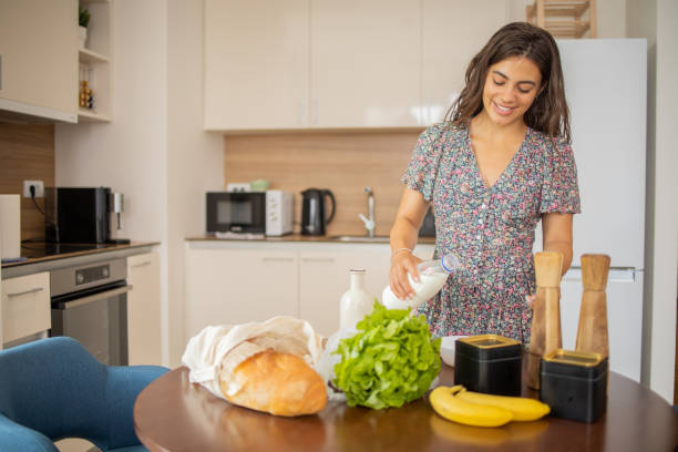 istock Young woman is preparing a meal 1938591951