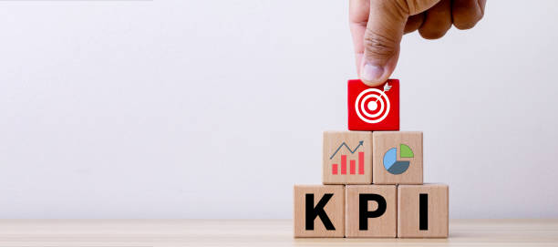 istock KPI text wood cube - Key Performance Indicator. Business planning and measure success, target achievement 1938674822