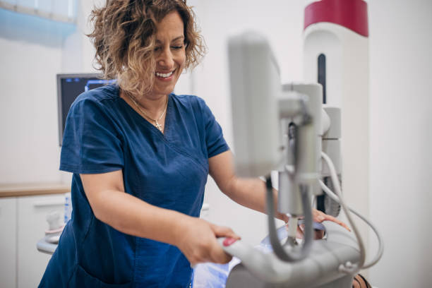 istock Female doctor working on ultrasound scanning machine 1938700618